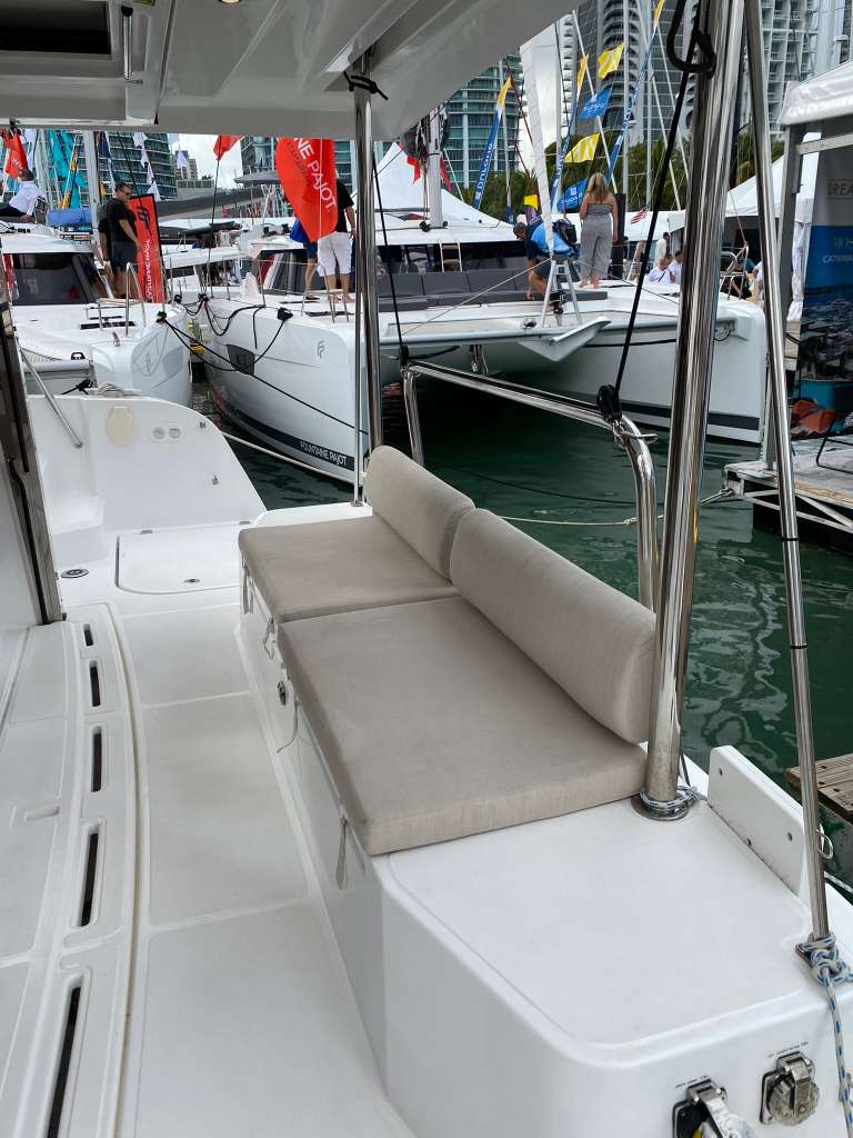 Bali Catspace stern deck seating area with cream cushions and marina view