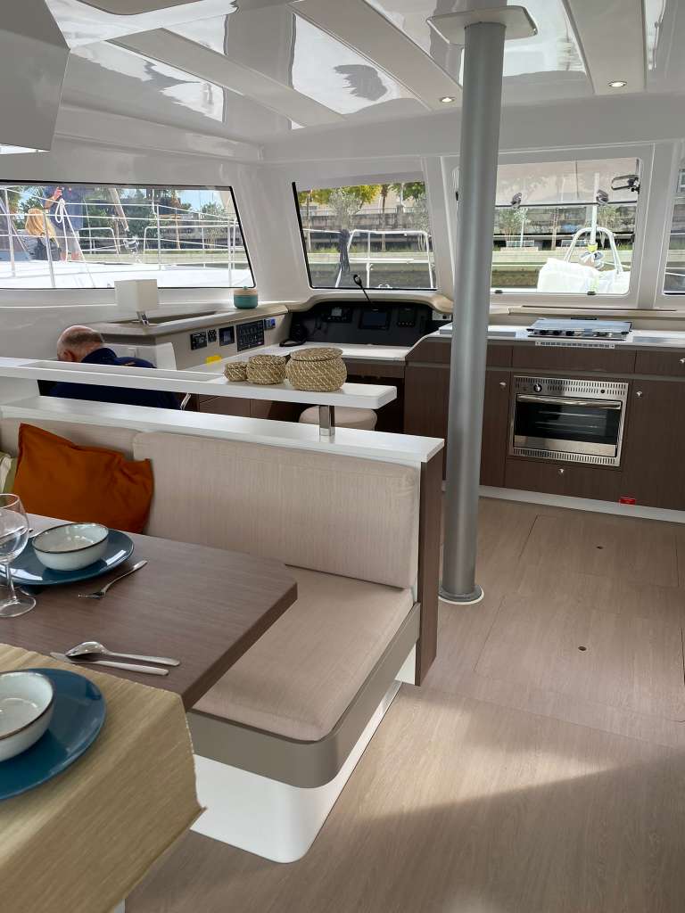 Bali Catspace salon interior with galley kitchen and helm station