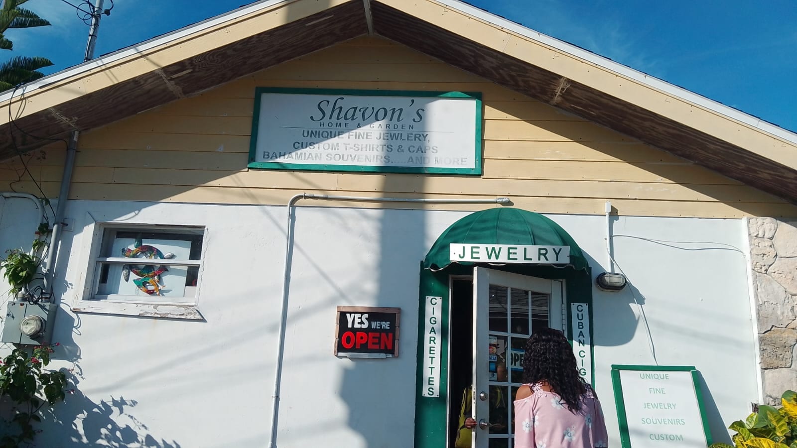 The green-awninged storefront of Shavon's Home & Garden boutique in New Plymouth, Green Turtle Cay, Abacos